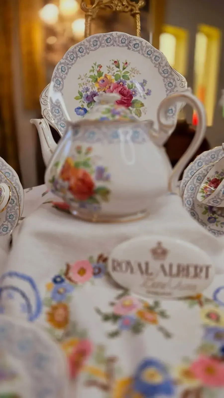 A Royal Albert teapot beside its backstamp