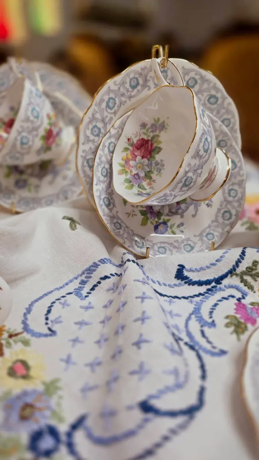 Royal Albert cups on a lace-edged cloth
