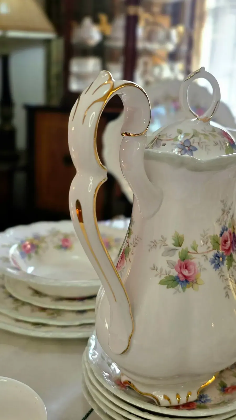 A Royal Albert coffee pot and plates