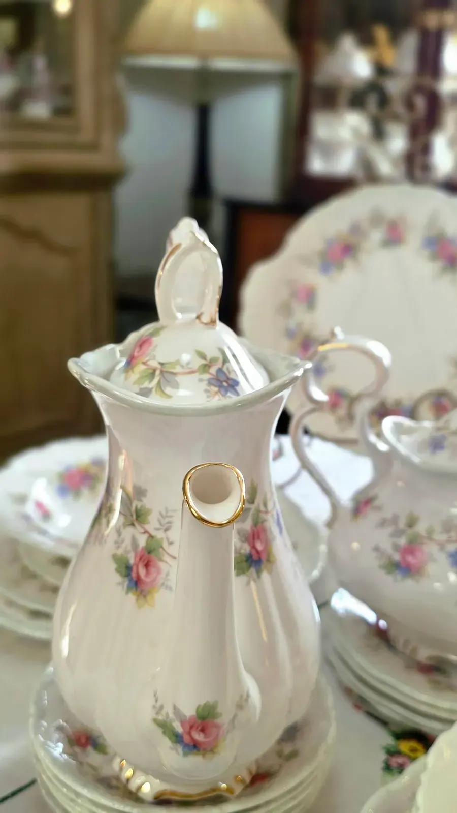A Royal Albert coffee pot with pink roses