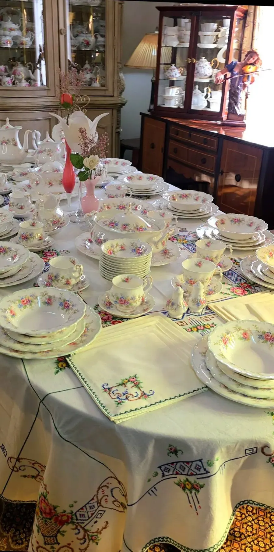 A table laid with Royal Albert cups, plates and napkins