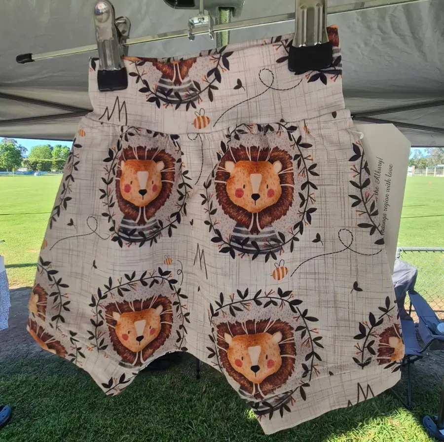 A lion print romper