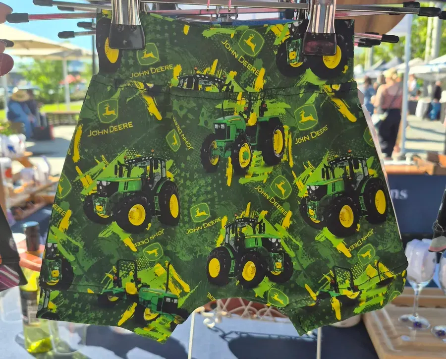 Green tractor print shorts
