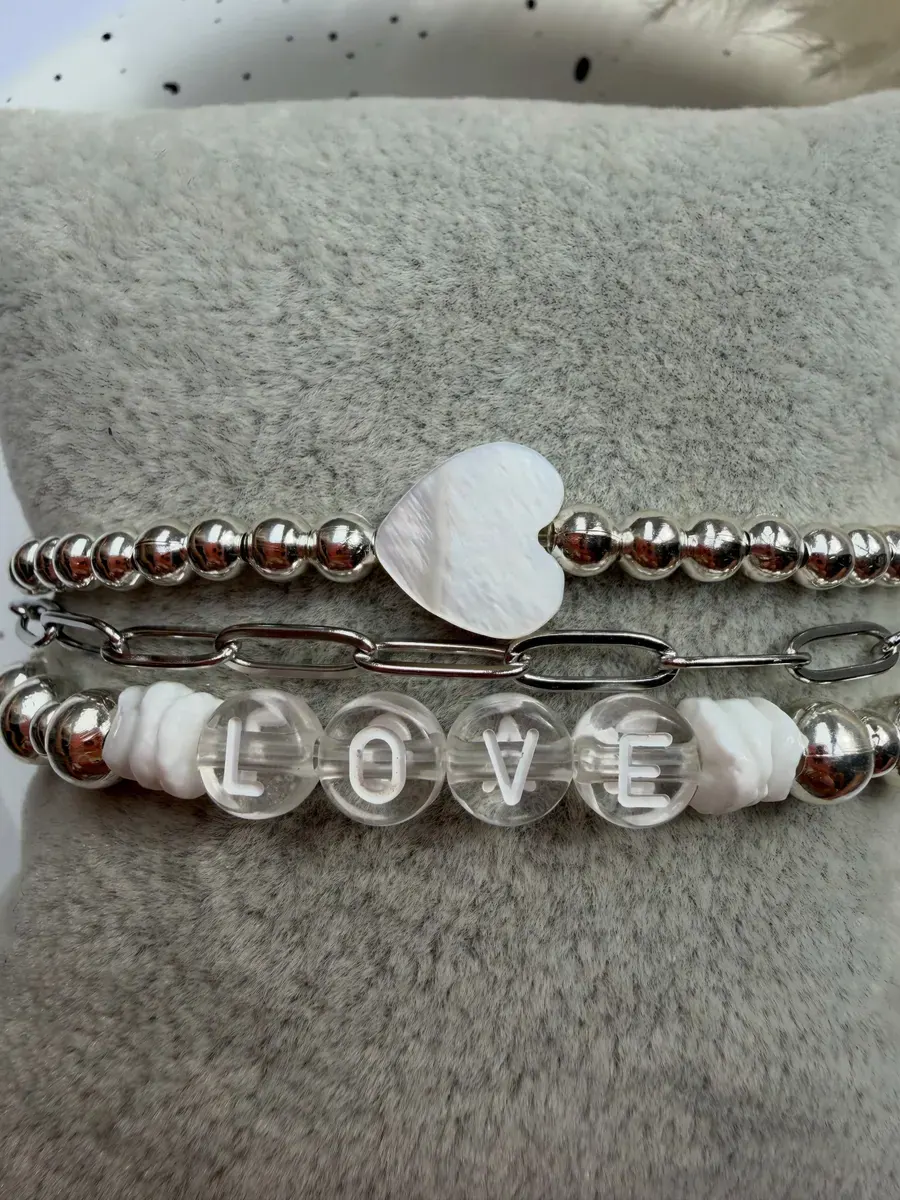 A bracelet with LOVE letter beads and a heart