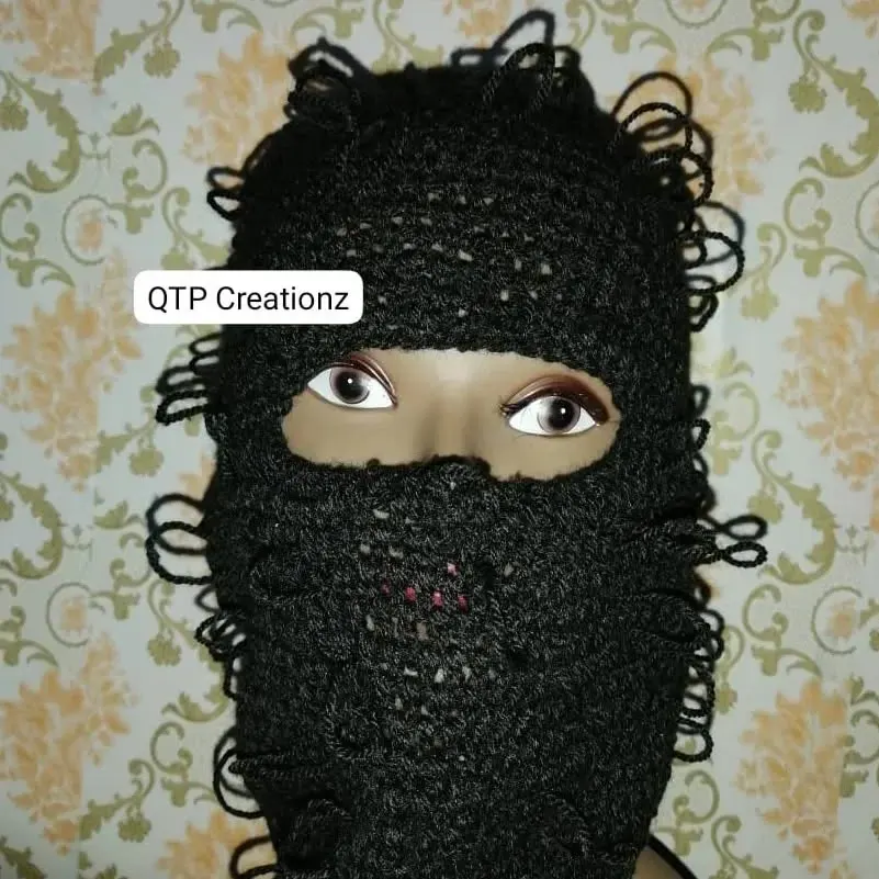A black crochet beanie