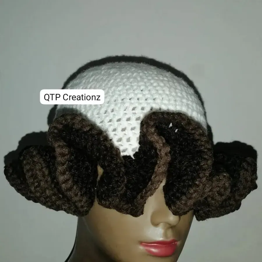 A crochet beanie with brown ruffles