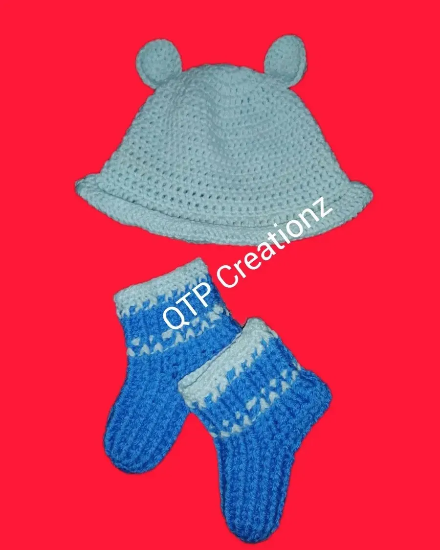 A blue crochet hat and socks