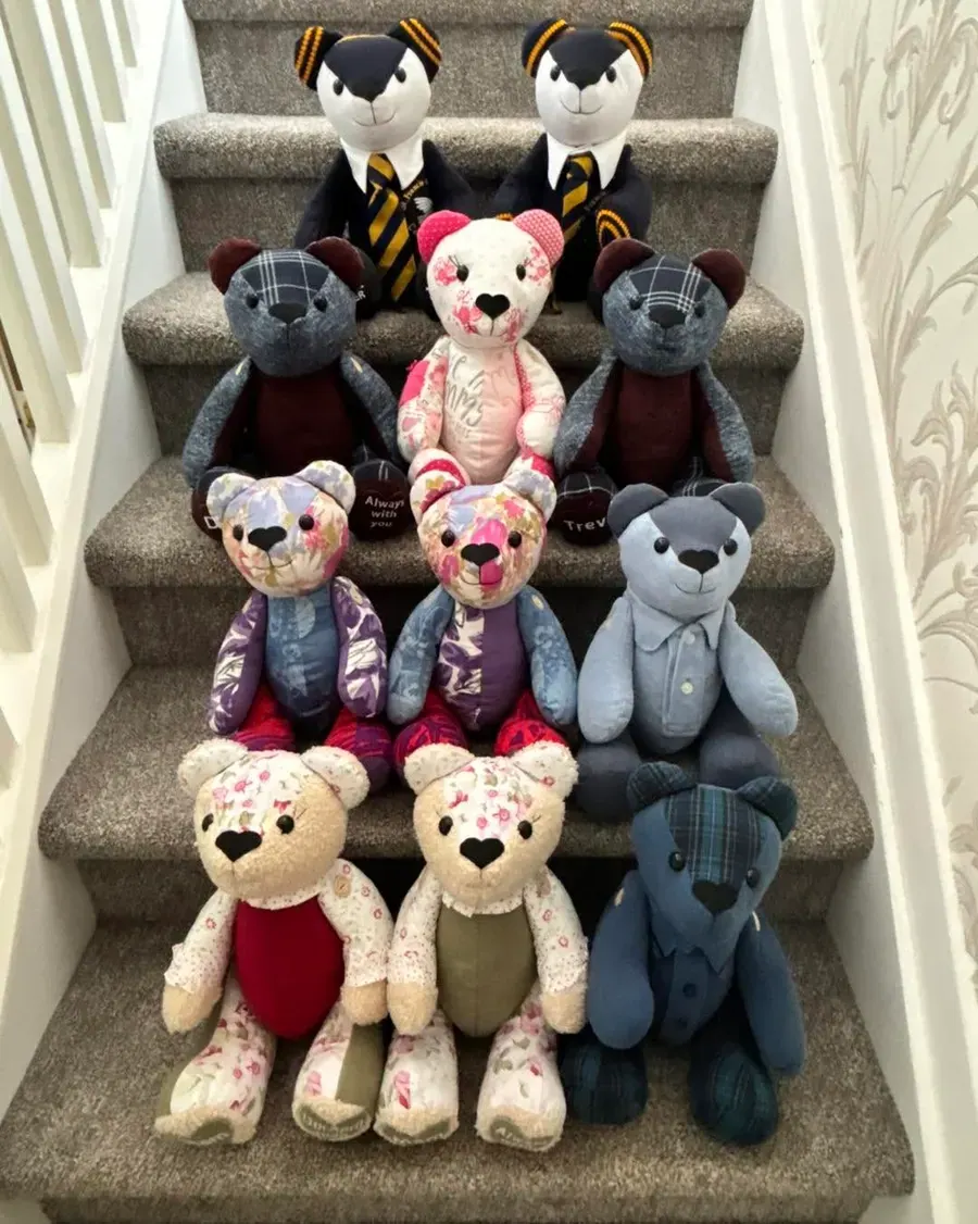 A group of memory bears on stairs