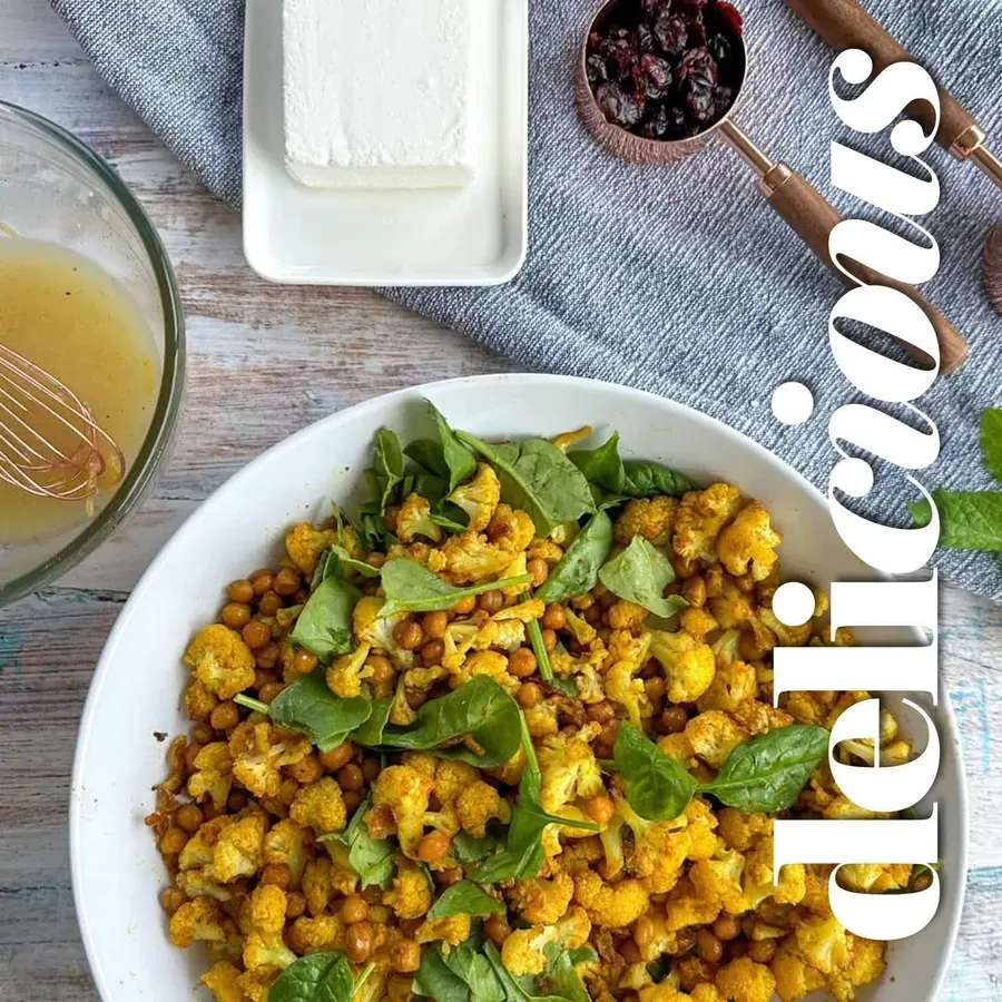 A golden corn dish in a white bowl
